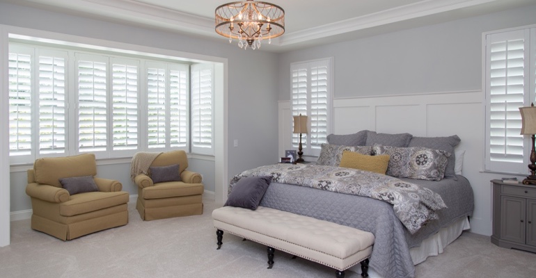 Plantation shutters in New Brunswick bedroom.